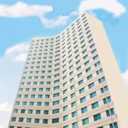 Overseas Chinese International Hotel Qingdao Extérieur photo