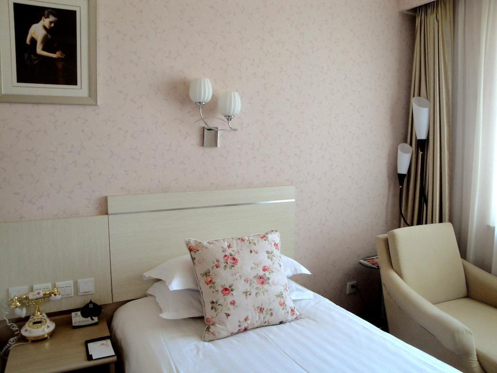 Overseas Chinese International Hotel Qingdao Extérieur photo