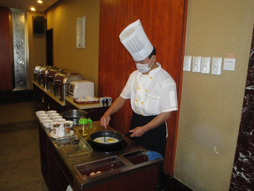 Overseas Chinese International Hotel Qingdao Extérieur photo