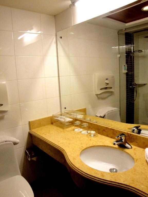 Overseas Chinese International Hotel Qingdao Chambre photo