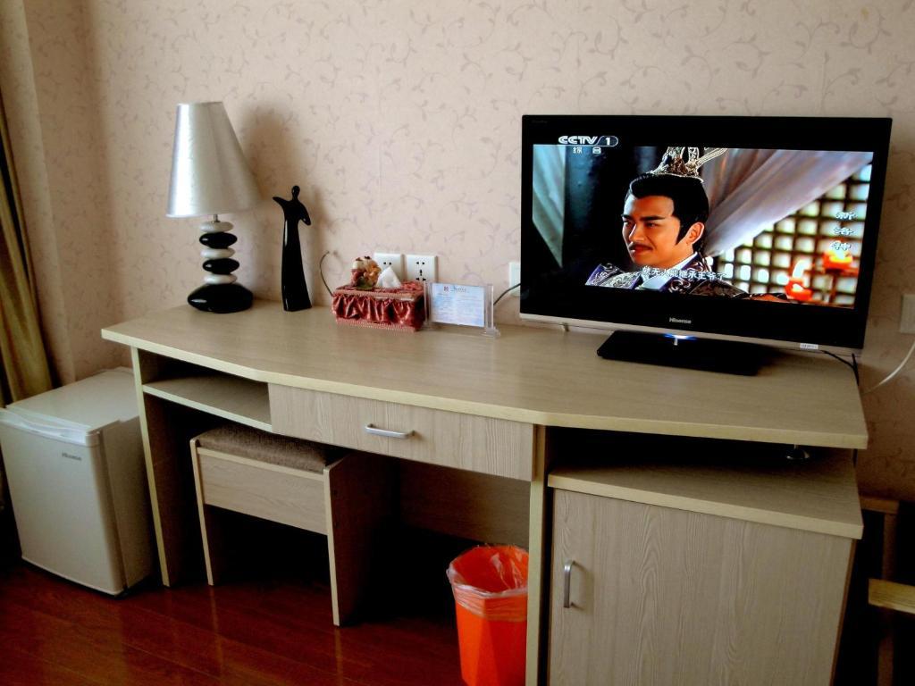 Overseas Chinese International Hotel Qingdao Chambre photo